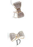 Dangling White Gold Rhinestone Studded Bow Shoe Charm